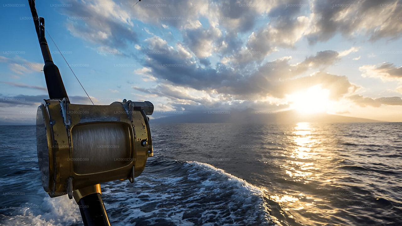 Fishing reel on a boat with the ocean and sunset in the background