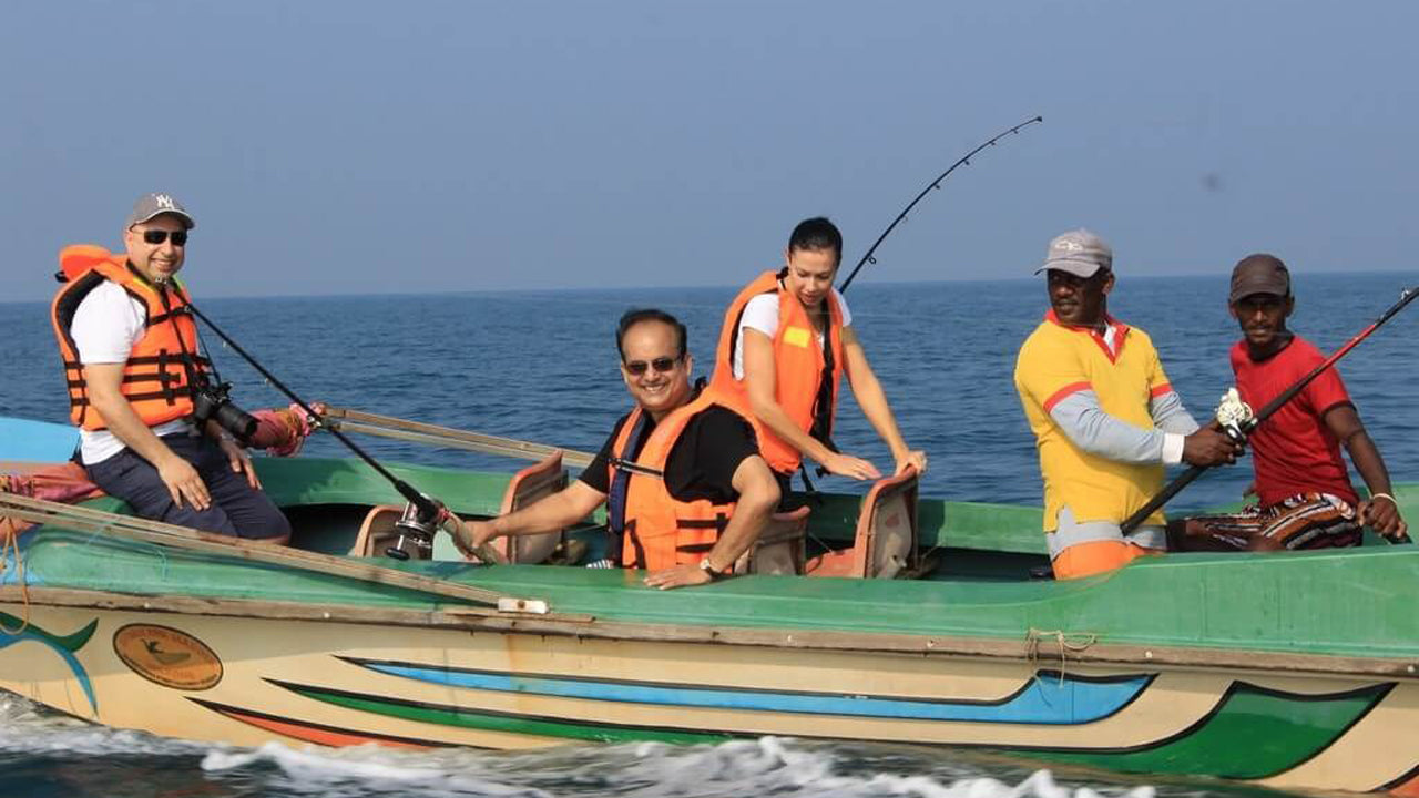 Group of people on a boat in the ocean
